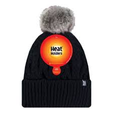 כובע נשים  SOLNA עם פונפון צבע קרם של HEAT HOILDERS